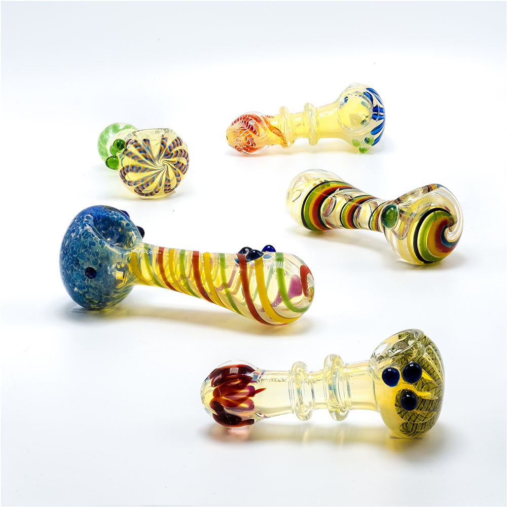 Five glass hand pipes on a white background