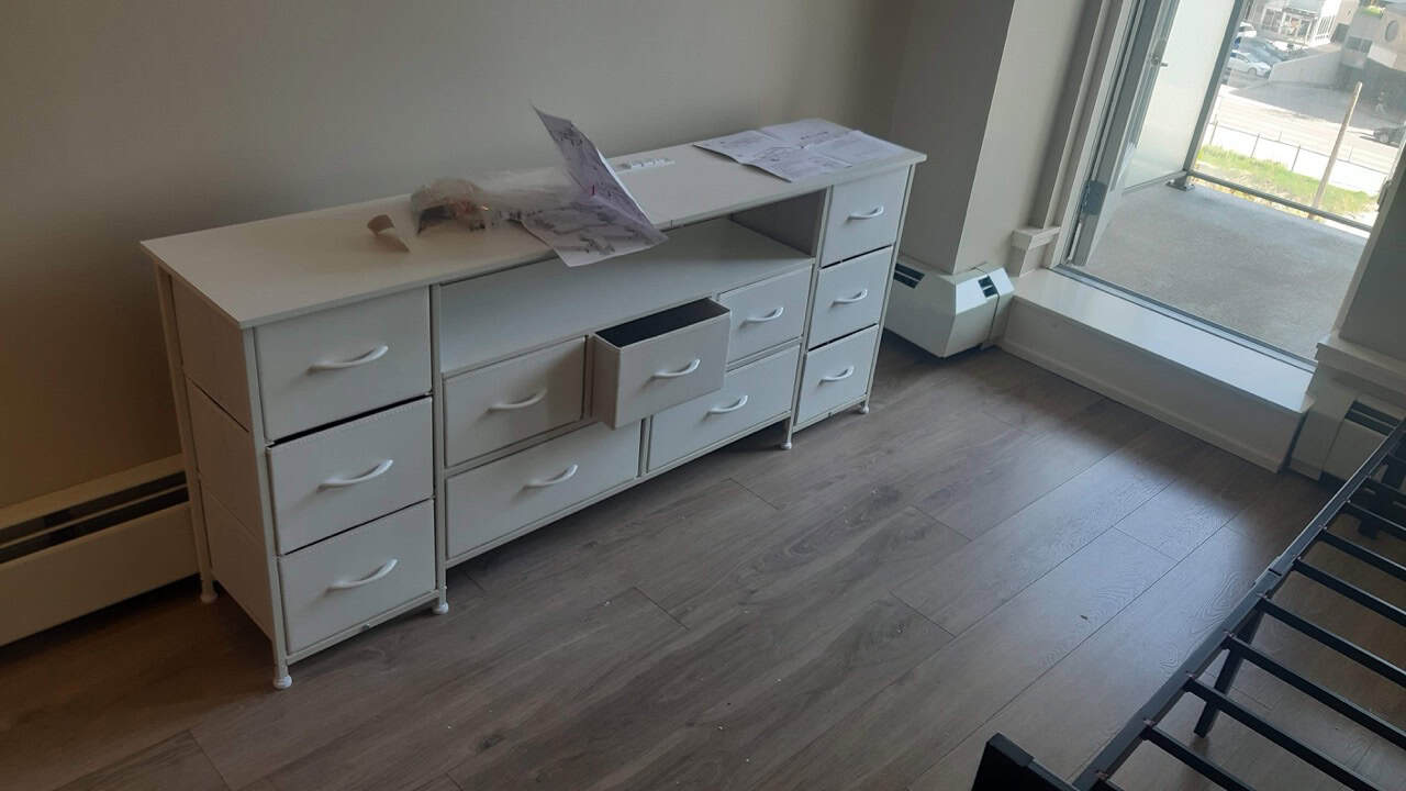 Eleven drawers dresser assembly