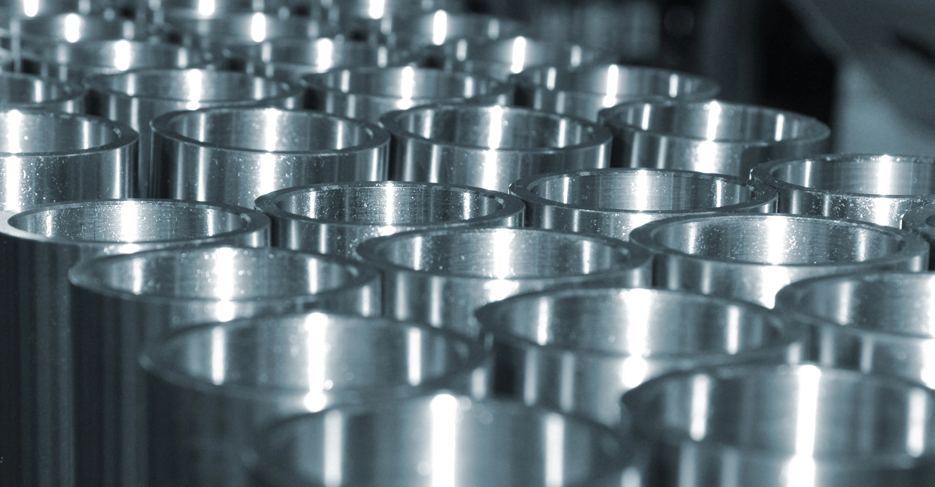 Stacked polished stainless steel metal tubes
