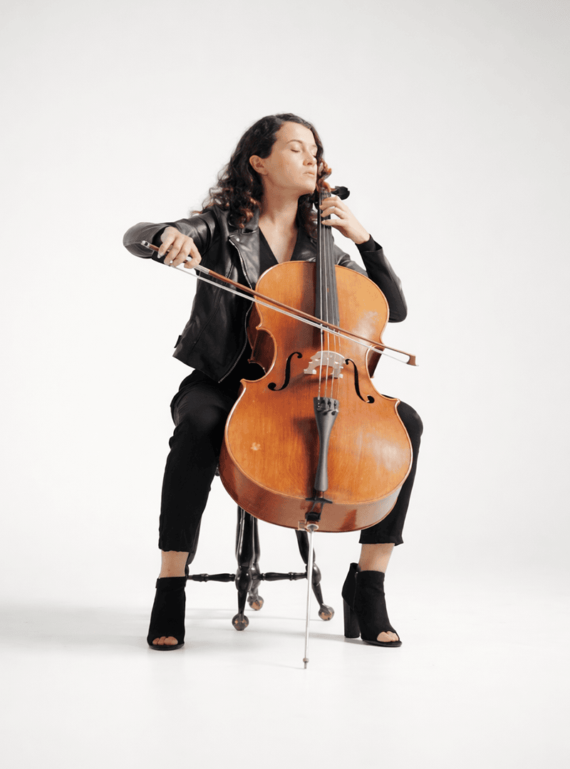 Single orange flower on the blue sky background.