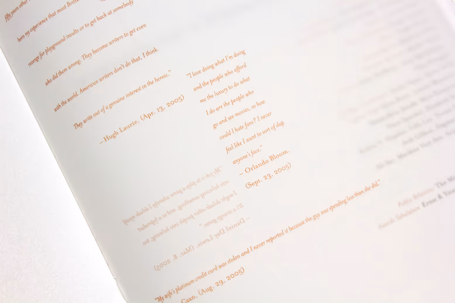 Open photo book spread showing vellum overlay quotes from the Golden Globes awards ceremony event.