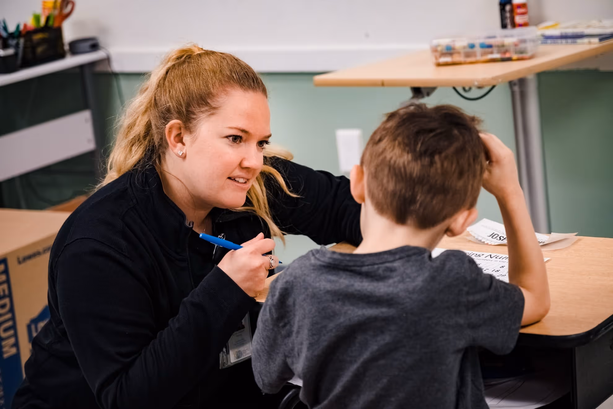 BIG staff member working with child