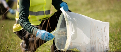 Crew in protective suits handling hazardous waste disposal