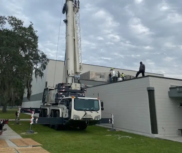 Crane lifting equipment at a commercial building site