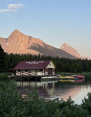 Maligne Lake boathouse and mountain scenery in Jasper National Park