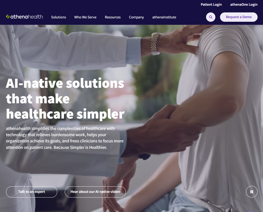 Screenshot of the athenahealth homepage promoting AI-native healthcare solutions, featuring messaging about simplifying healthcare workflows alongside a healthcare provider examining a patient during a clinical visit.