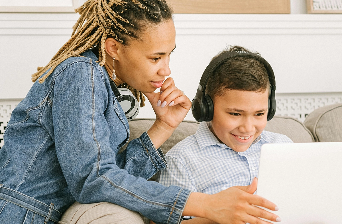 Mother with son on computer