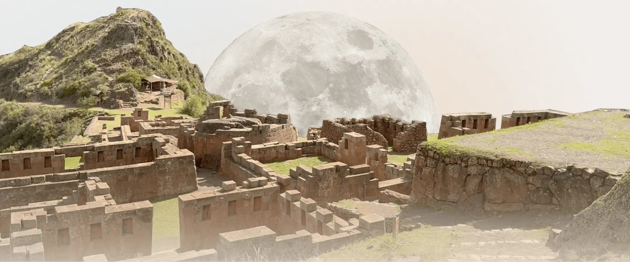 Ancient stone ruins on a hillside with a large full moon in the background.