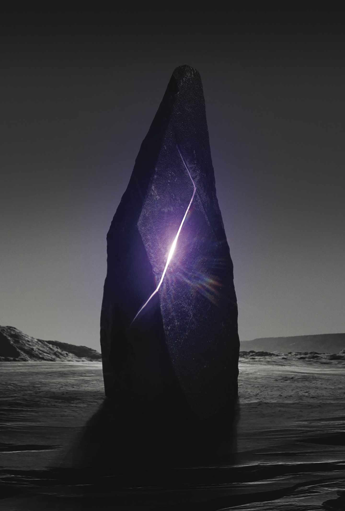 Dark stone monolith on a beach, split by a glowing purple light.