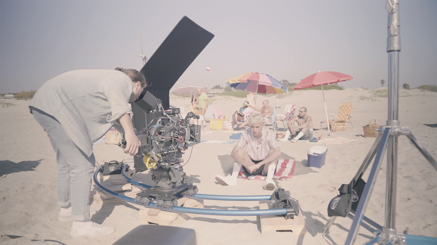 The video features Troyesivan discussing the creative process and challenges behind producing a visually distinctive music video, emphasizing collaboration, atmosphere, and shared vision. — poster video