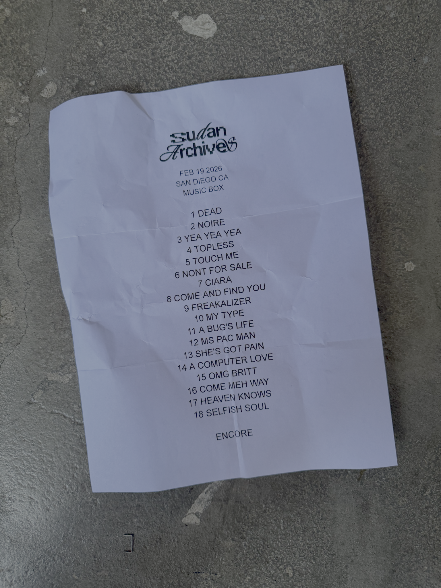 Sudan Archives concert set list for San Diego show lies on concrete floor