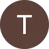 Cercle marron avec la lettre blanche T au centre.