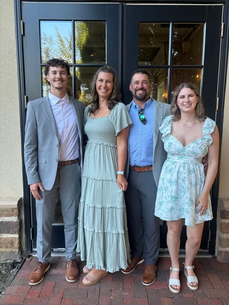 Josh Patterson with his family, dressed up for an occasion