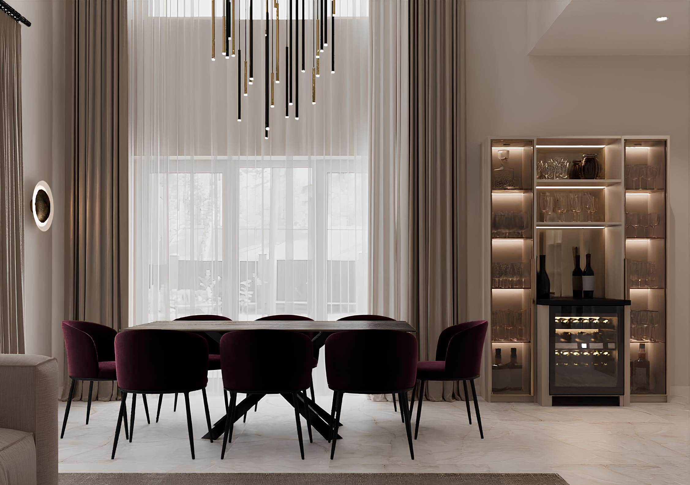 Modern dining room with dark velvet chairs around a black table and a backlit glass cabinet with bottles and glasses.