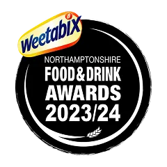 Weetabix logo above the text 'Northamptonshire Food & Drink Awards 2023/24' inside a black circular badge.