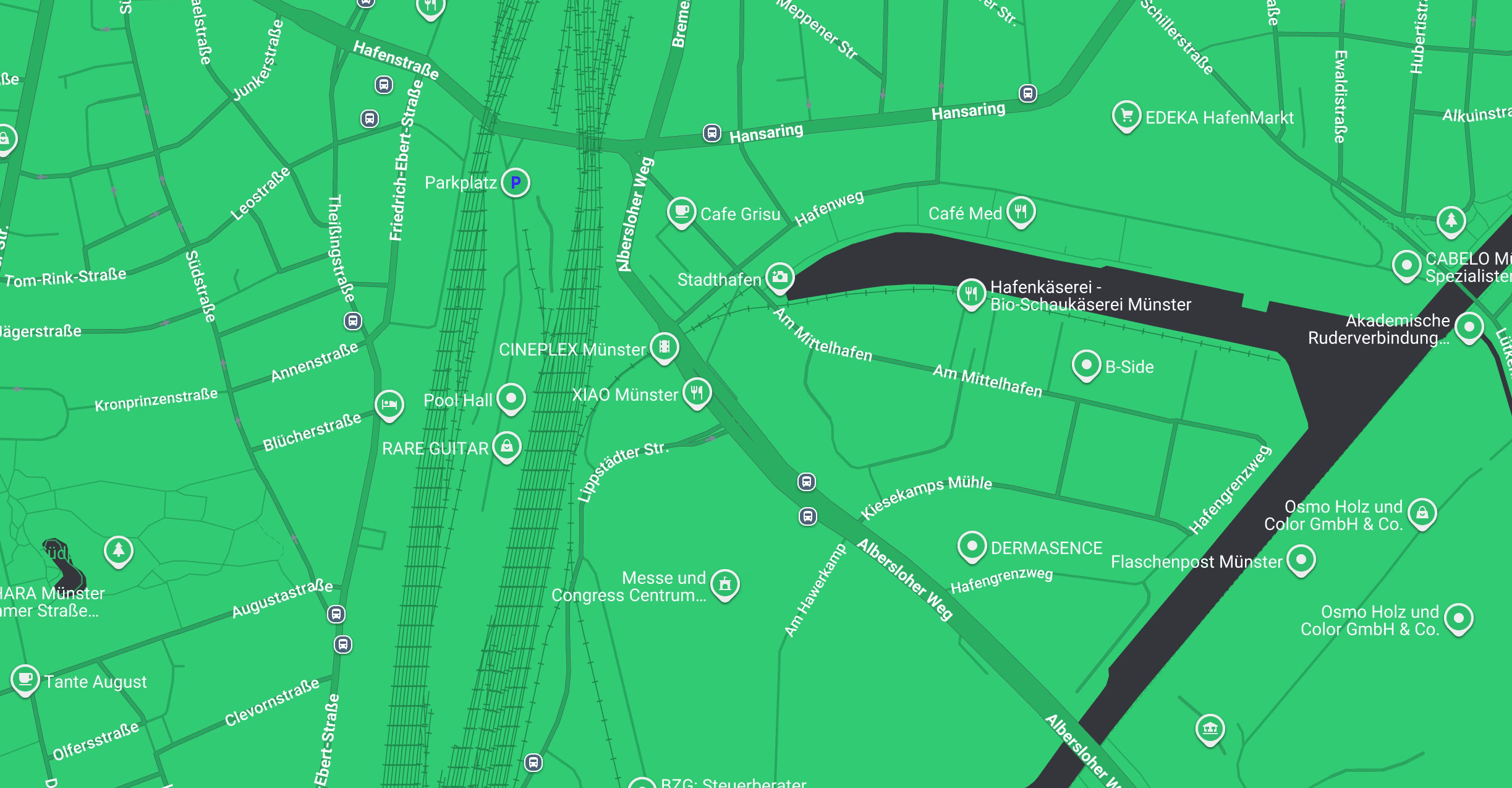 Karte von Münster mit Straßen, Cafés, Parkplätzen und Geschäftsstandorten am Hafen.