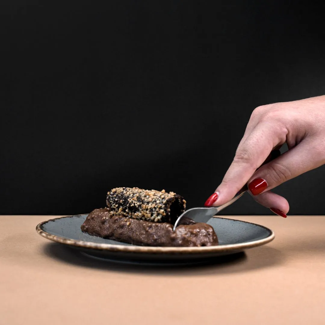 Skqutz logo with stylized tree and lettering.