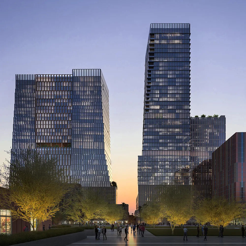 Arro, a modern glass skyscraper reflecting sunset with lit trees and people walking below.