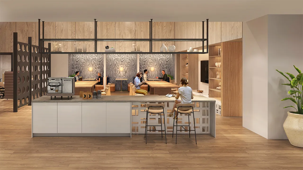 Modern coworking space with coffee bar, wooden tables, seating booths, and people working and chatting.