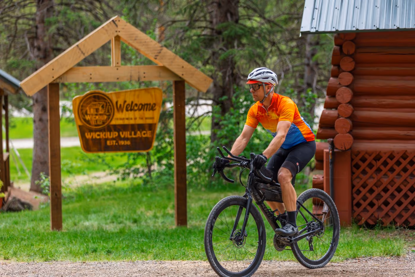 Biker leaving Wickiup Cabins to explore the trails in Spearfish Canyon