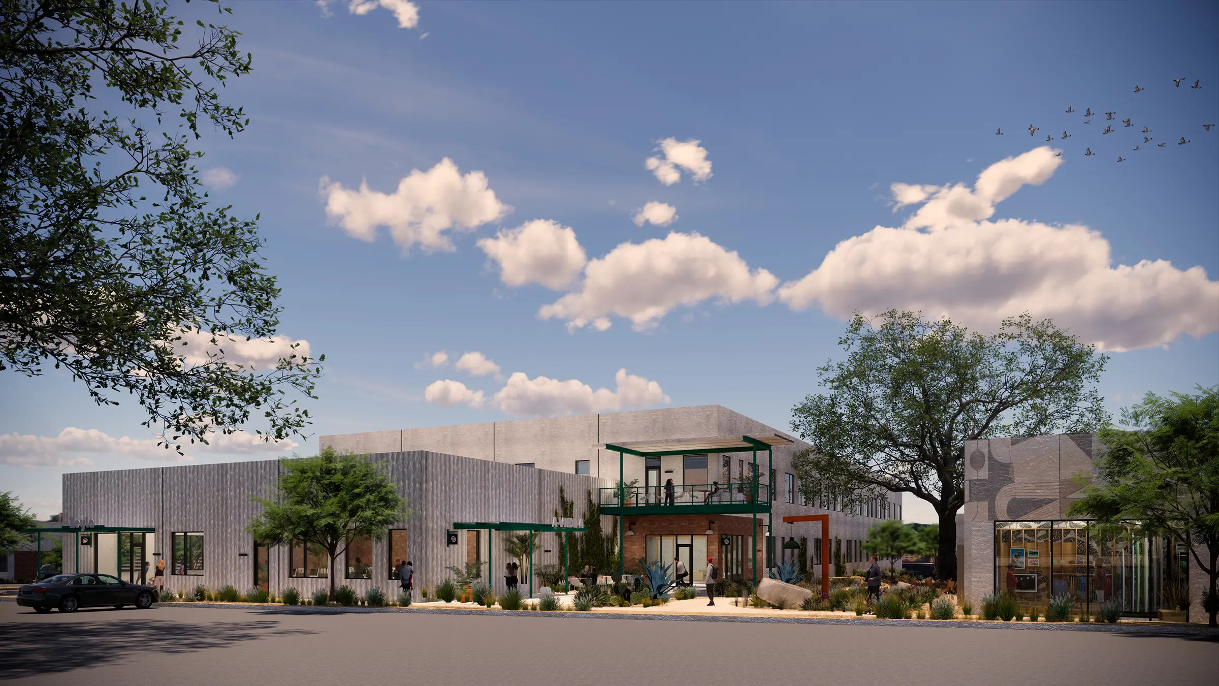 Modern two-story building with outdoor patio, surrounded by trees and plants under a partly cloudy sky with birds flying.