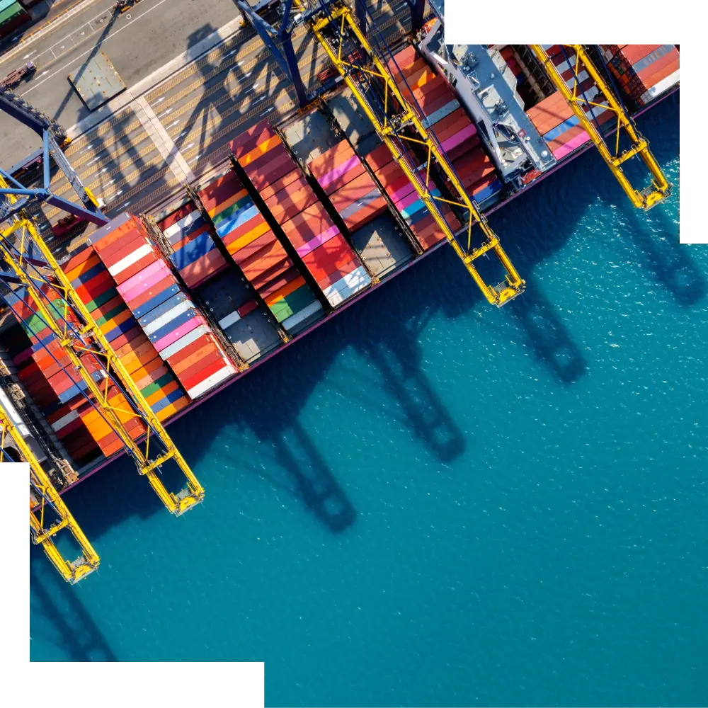 A port with a moored cargo ship.