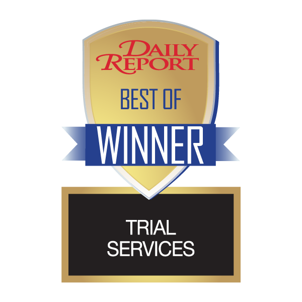 Gold shield with blue banner reading 'Winner' and text 'Daily Report Best of Trial Services'.