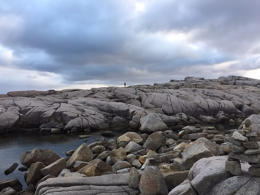 The cover for the single, Small Ships, which shows a rocky coastline.