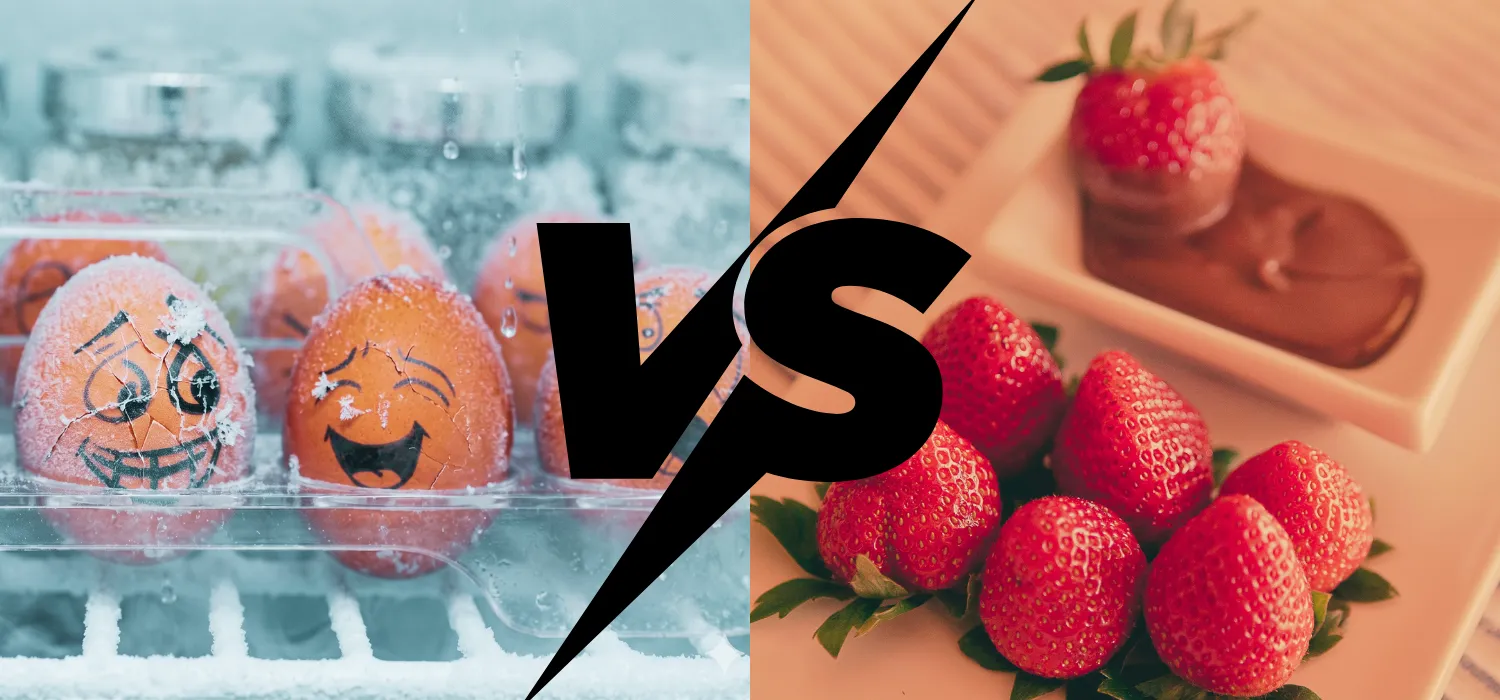 Frozen eggs with cartoon faces in a frost-covered carton versus fresh strawberries being dipped in chocolate sauce. Illustrating egg freezing vs. natural conception.
