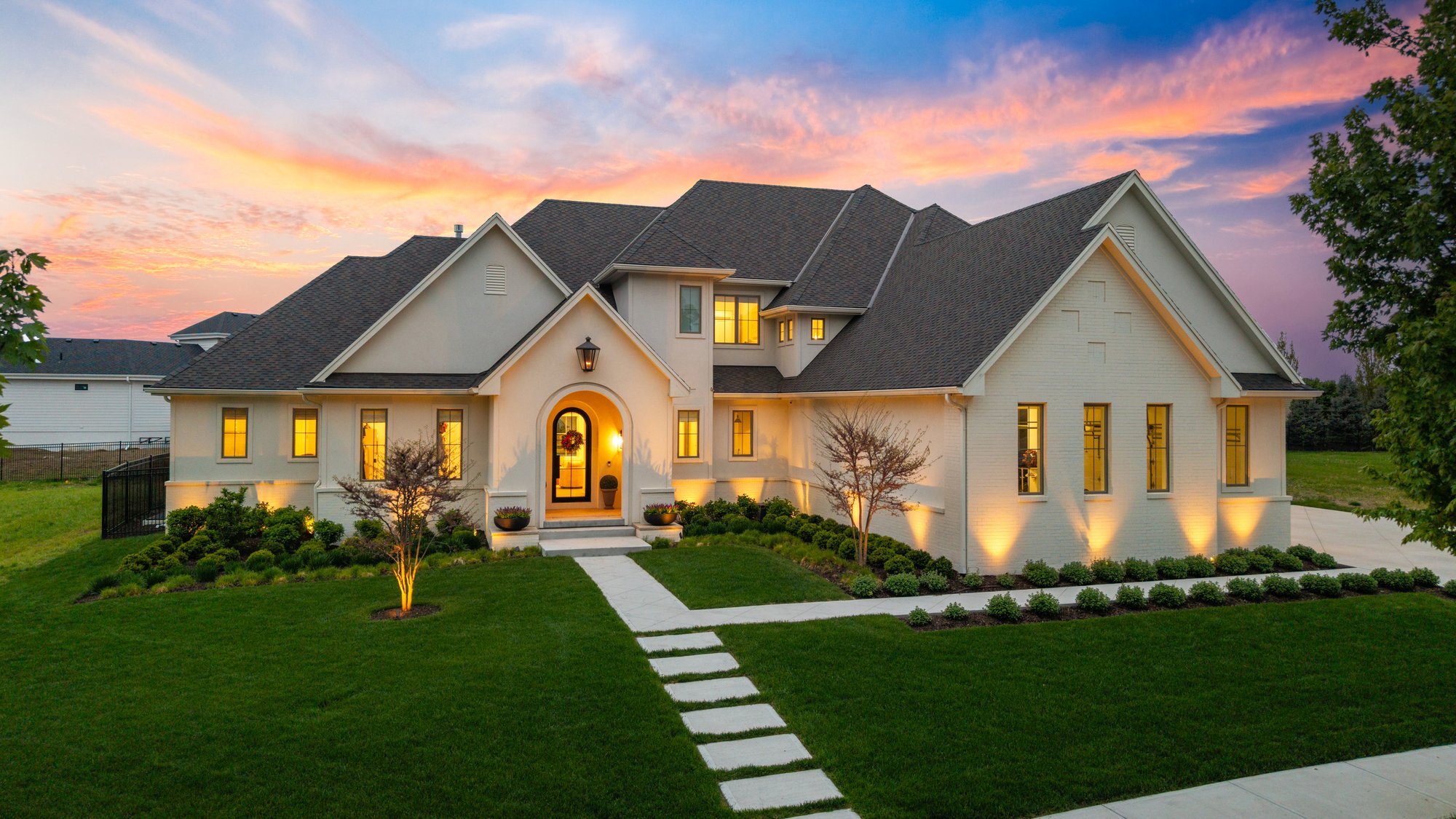 Twilight exterior with warm interior glow