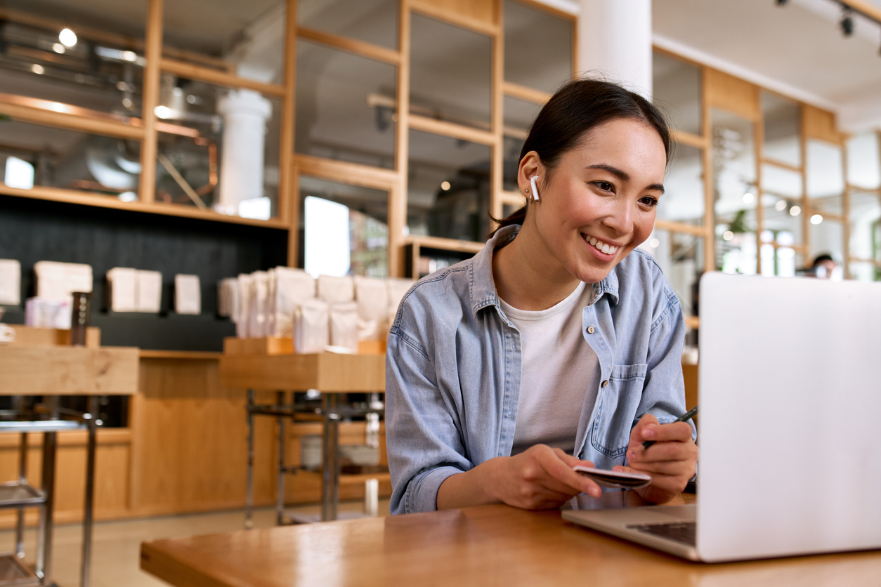 woman looking at laptop