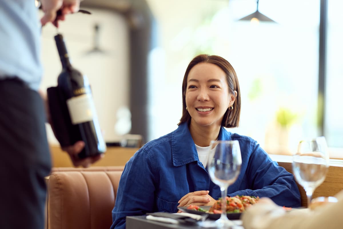 person waiting for her wine