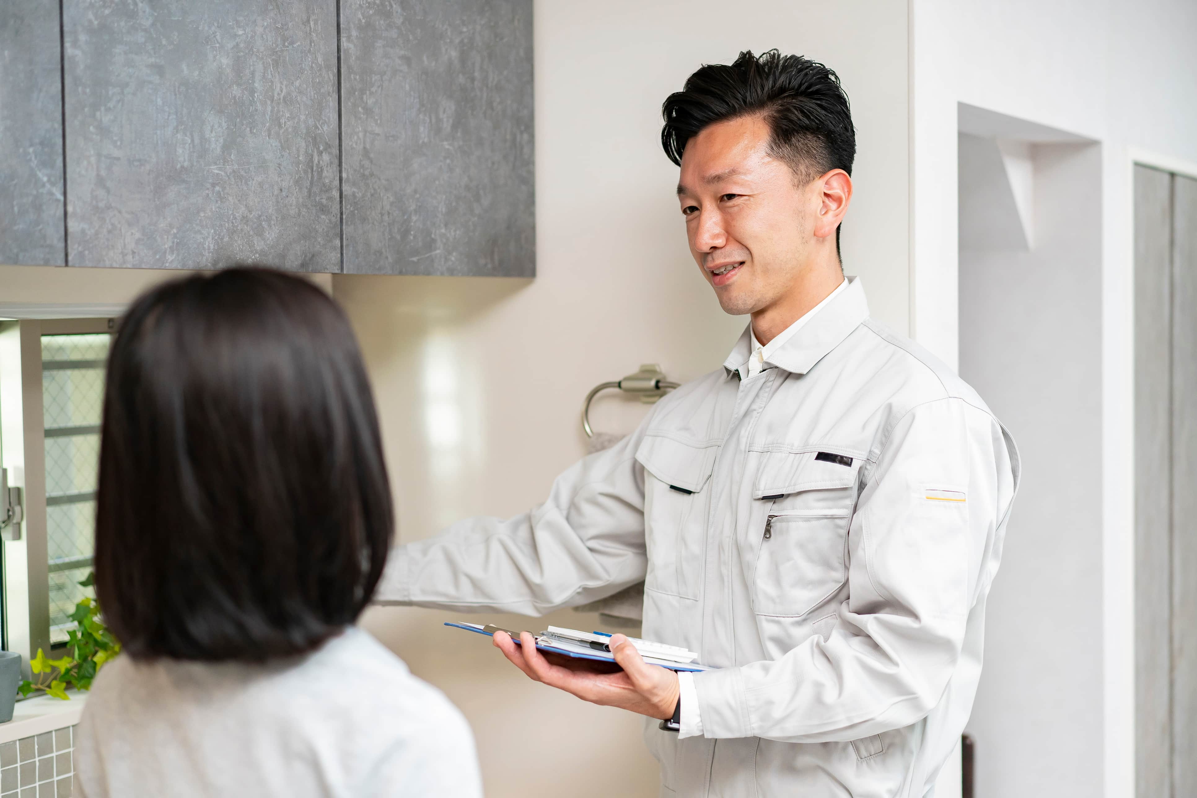 plumber collecting payment with tap to pay