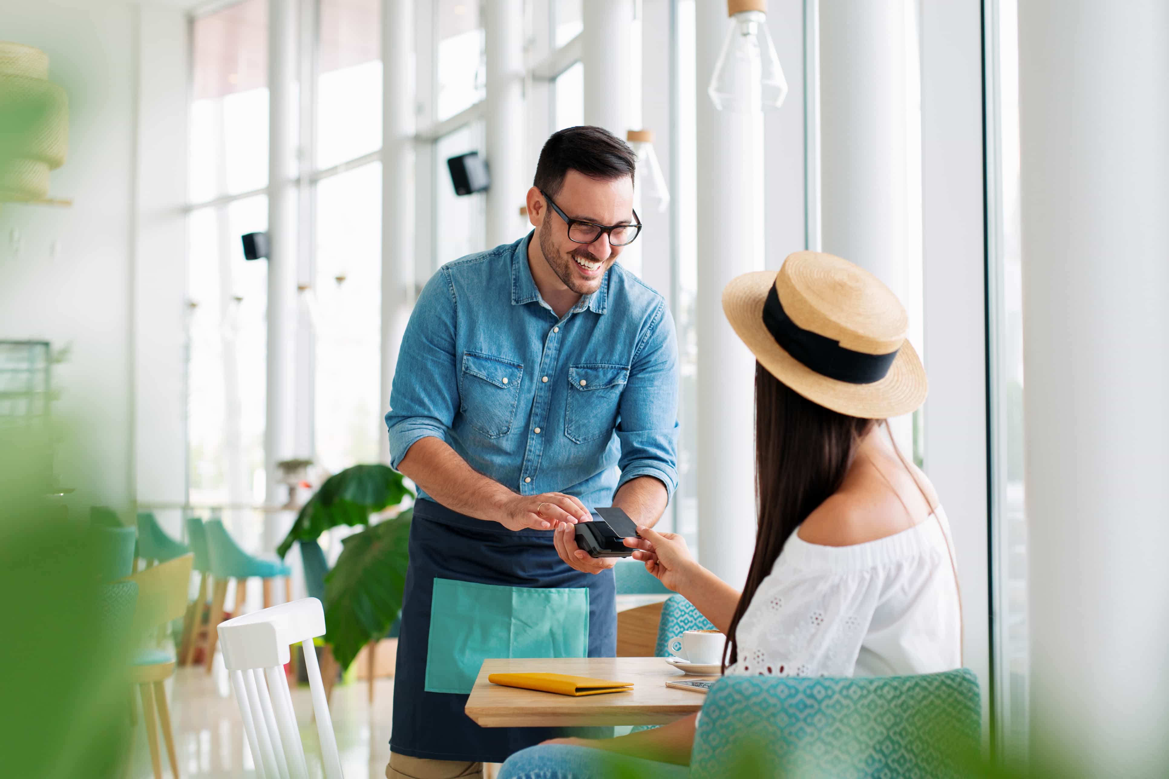 man collecting payment with eftpos