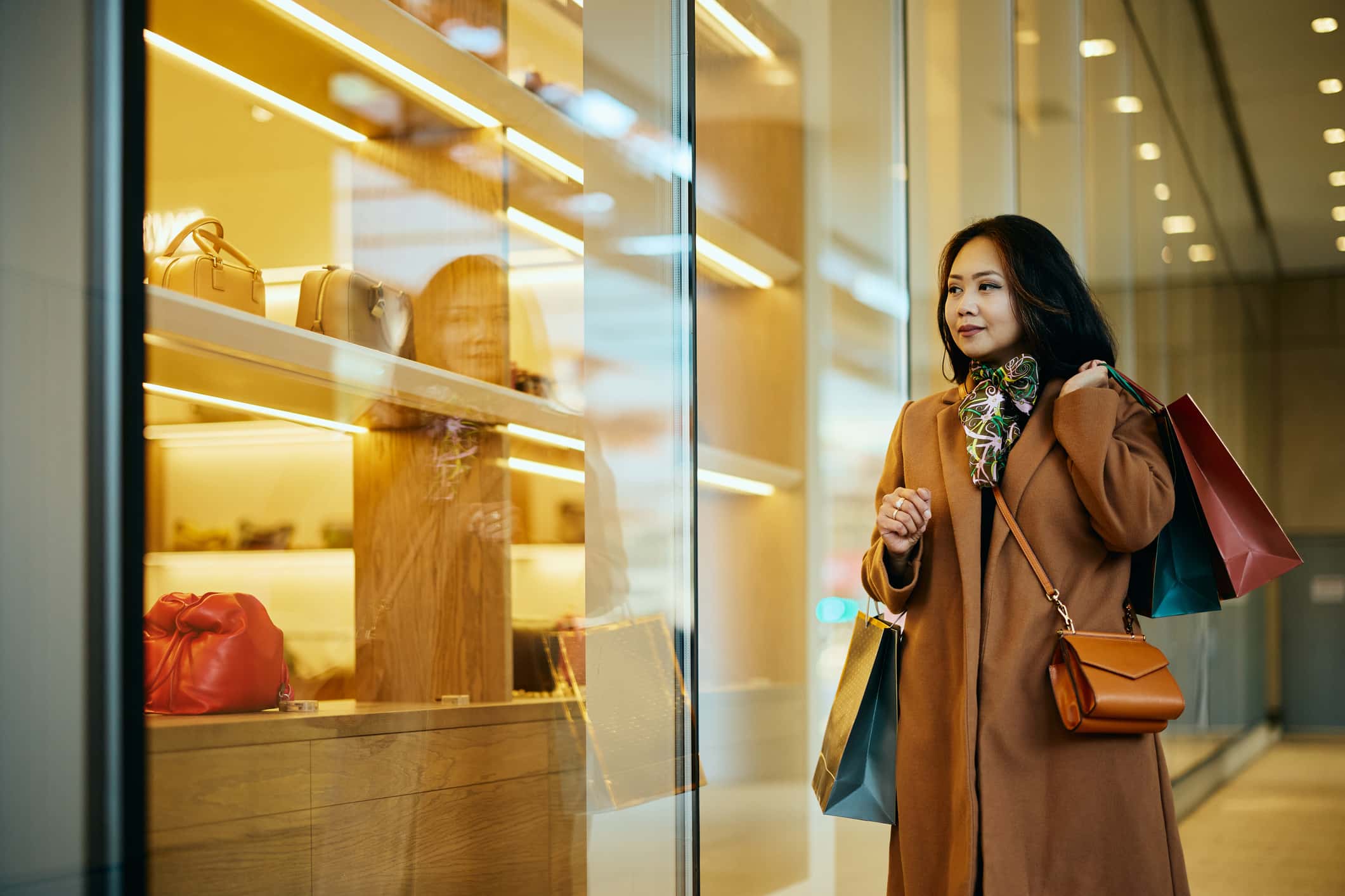 asian woman window shopping 