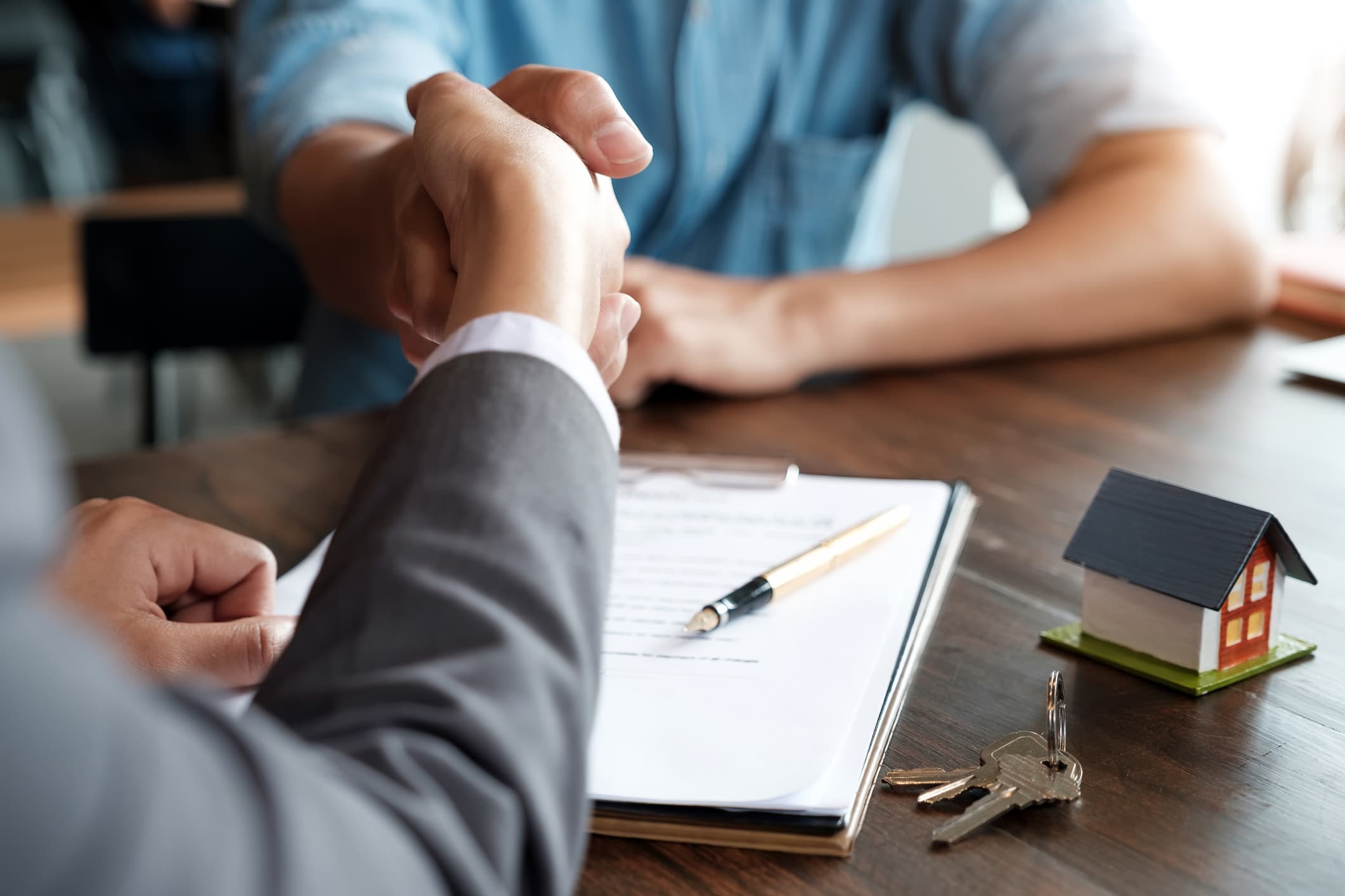 property agent shaking hands collect deposit with tap to pay kpay