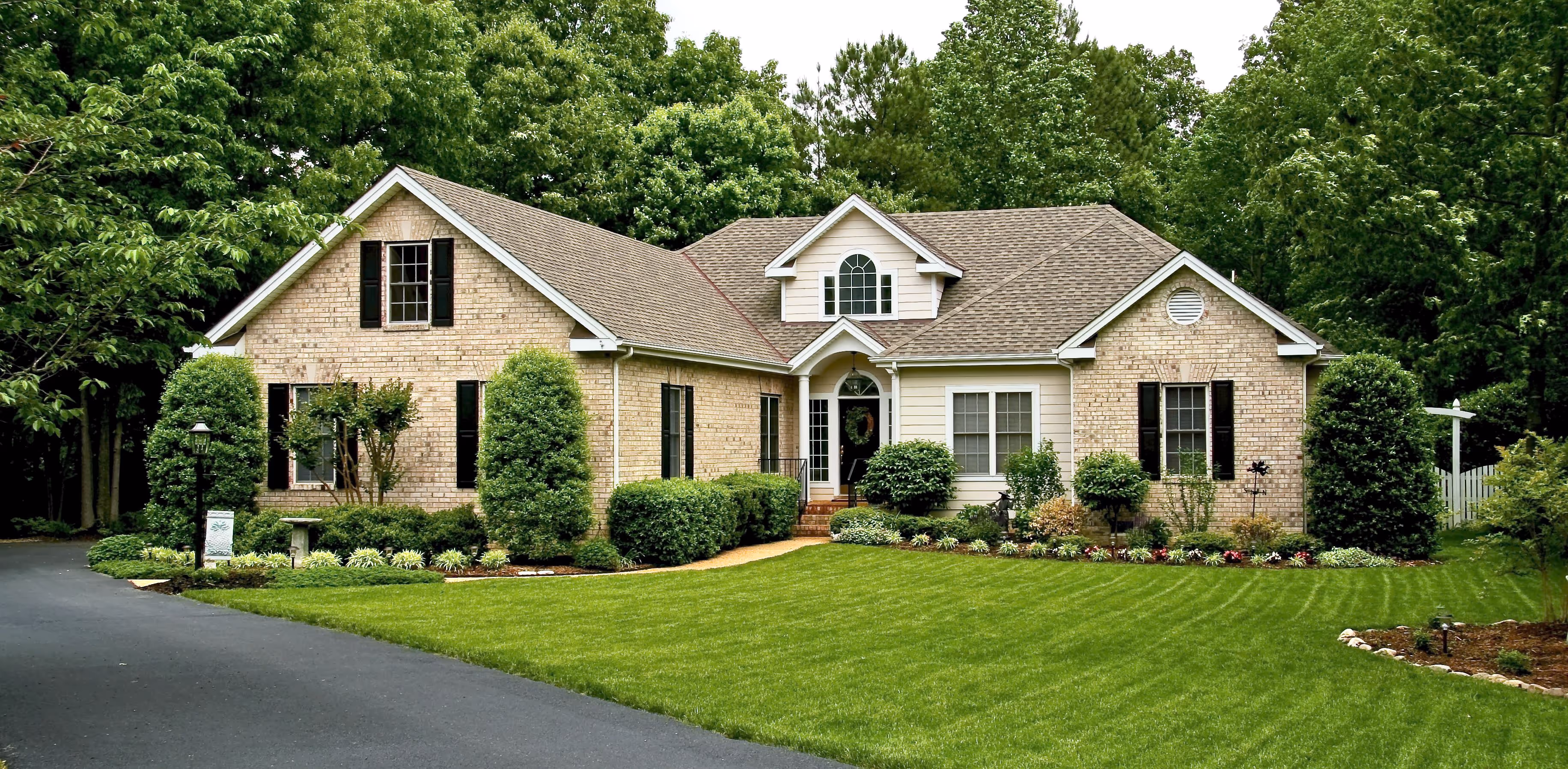 Professional house cleaner vacuuming a living room in San Jose