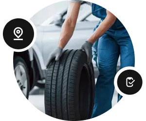 Employee holding a tire