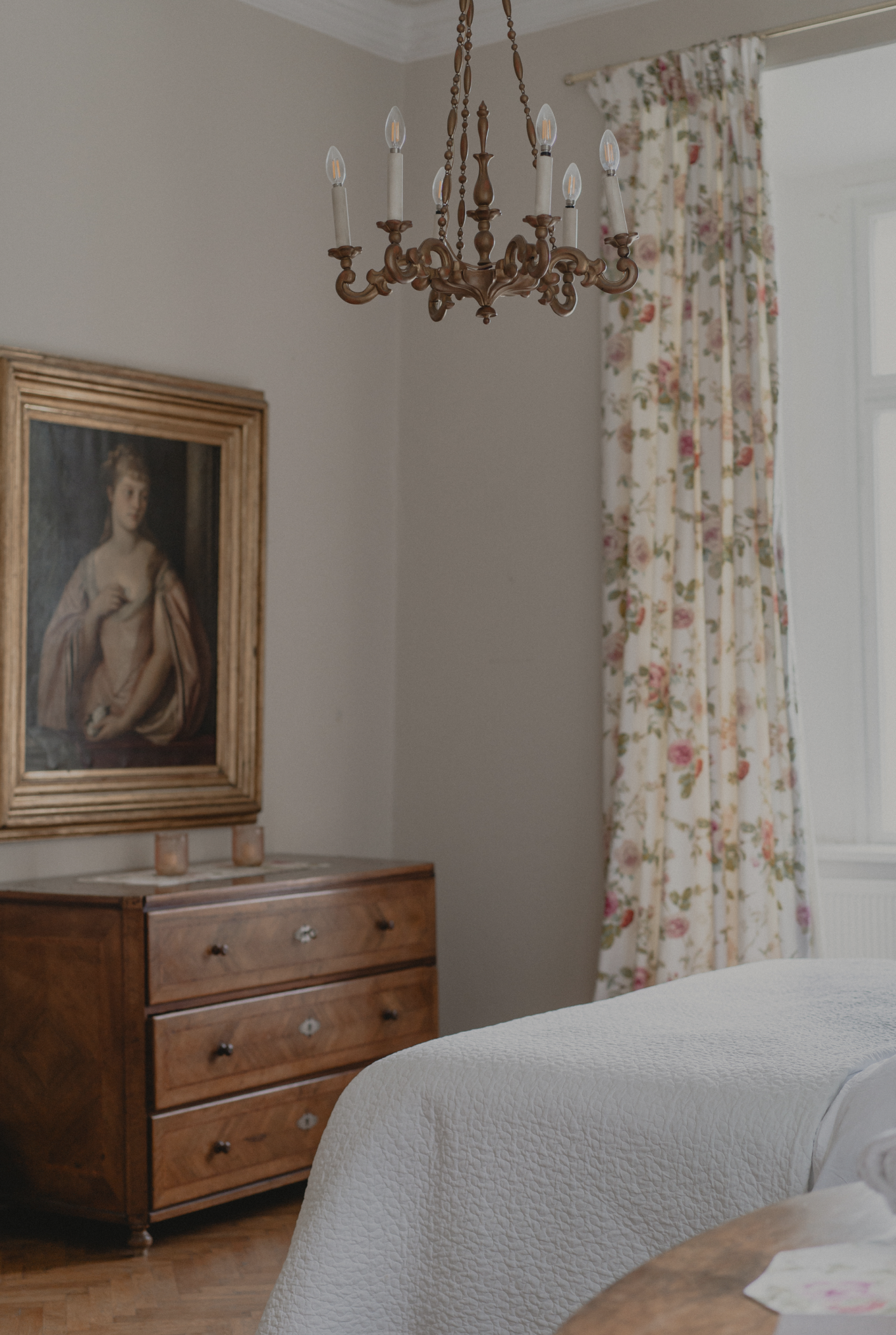 A statue of a mermaid in a garden