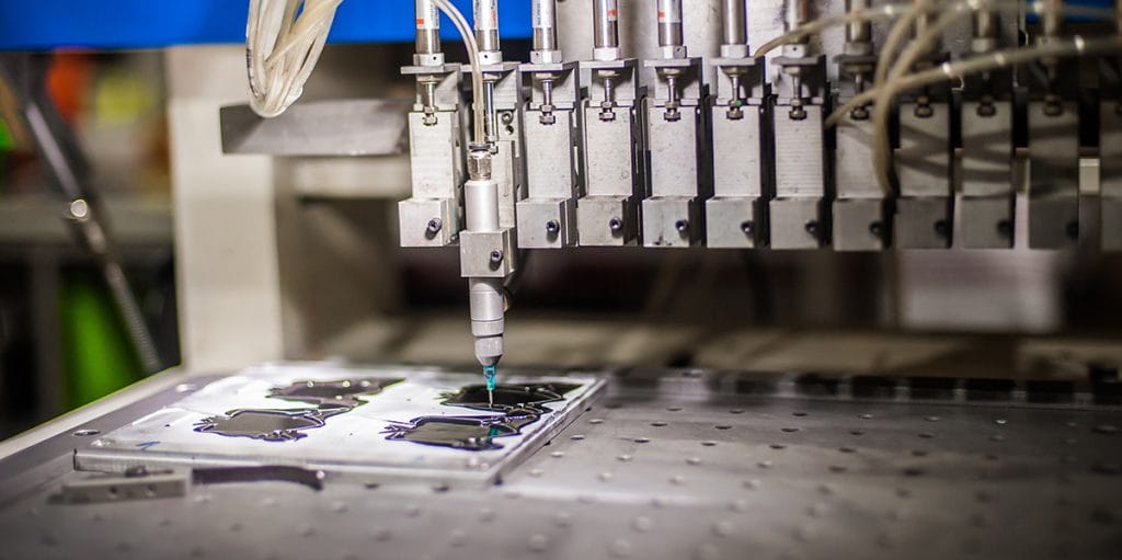 Image showing microdispening on multiple parts for precision engineering of microliter dispense solutions