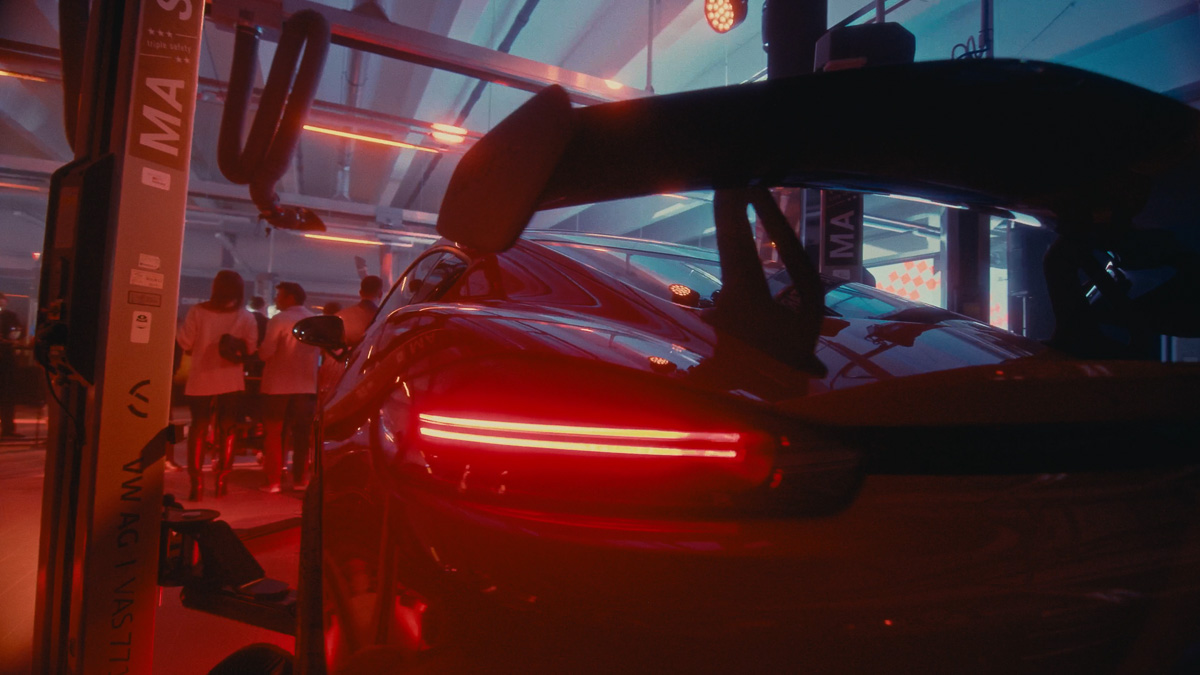 Porsche rear lights in the red-lit event space