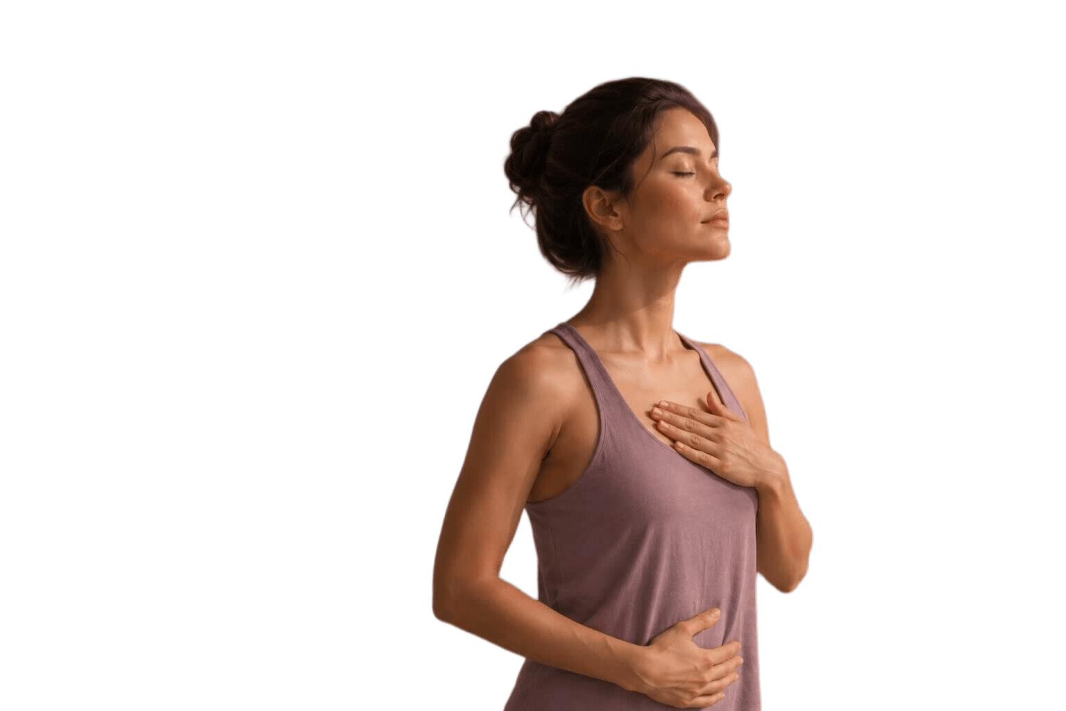 Fit woman with eyes closed practicing mindful breathing, one hand on her chest and the other on her abdomen, symbolizing body awareness, calmness and holistic wellbeing.
