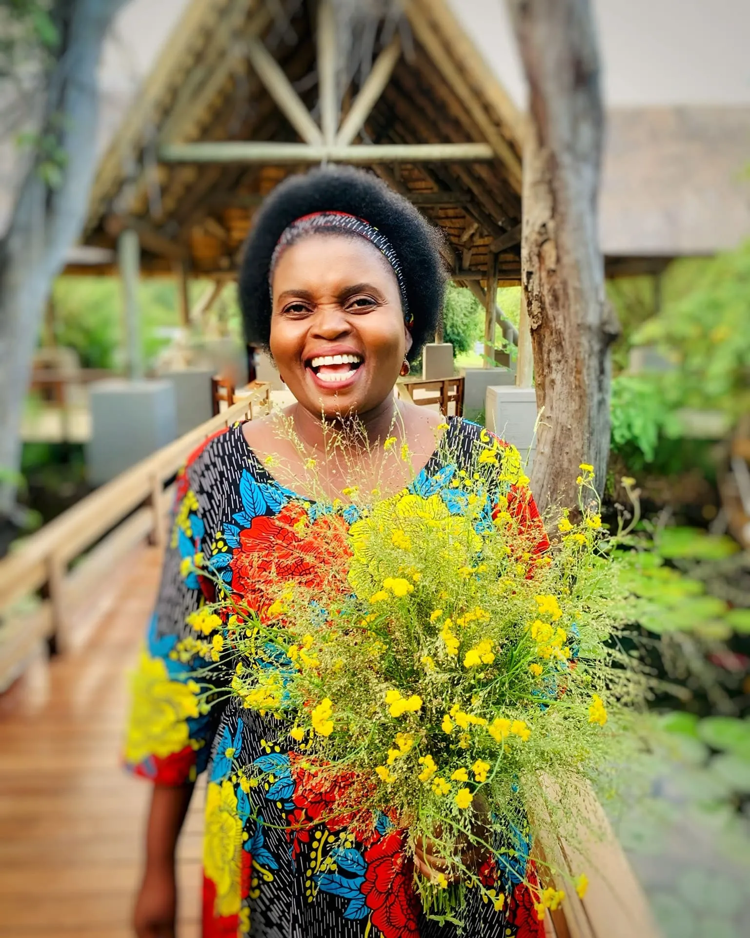 A smiling woman at Royal Chundu