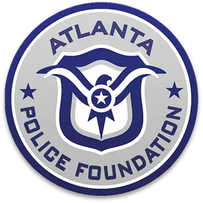 Seal of the Atlanta Police Foundation with a stylized eagle, stars, and the foundation's name in blue and gray colors.