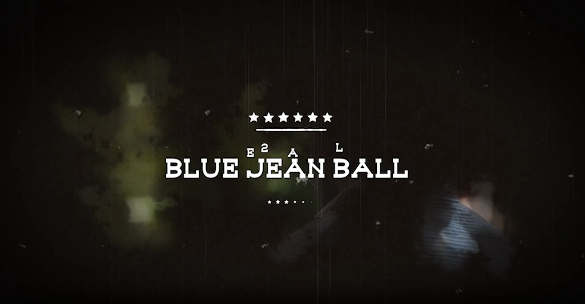 Vintage-style text saying 'BLUE JEAN BALL' with five stars above and four stars below on a dark grungy background.