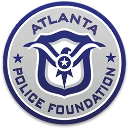 Atlanta Police Foundation emblem featuring an eagle with a star at its center, encircled by the foundation's name and two stars.
