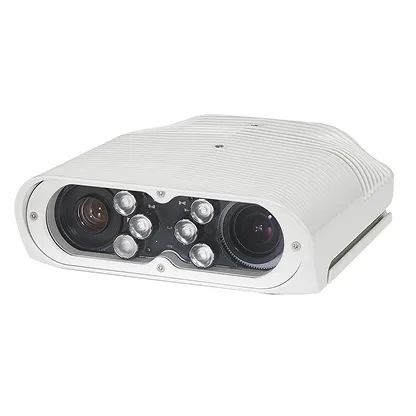 White security camera with dual lenses and multiple infrared LEDs for night vision.