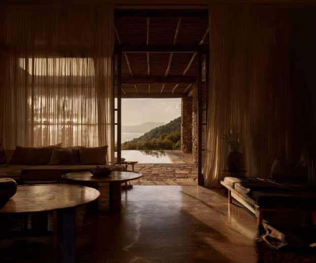 Hospitality and residential design — hotel interior with atmospheric lighting and natural materials