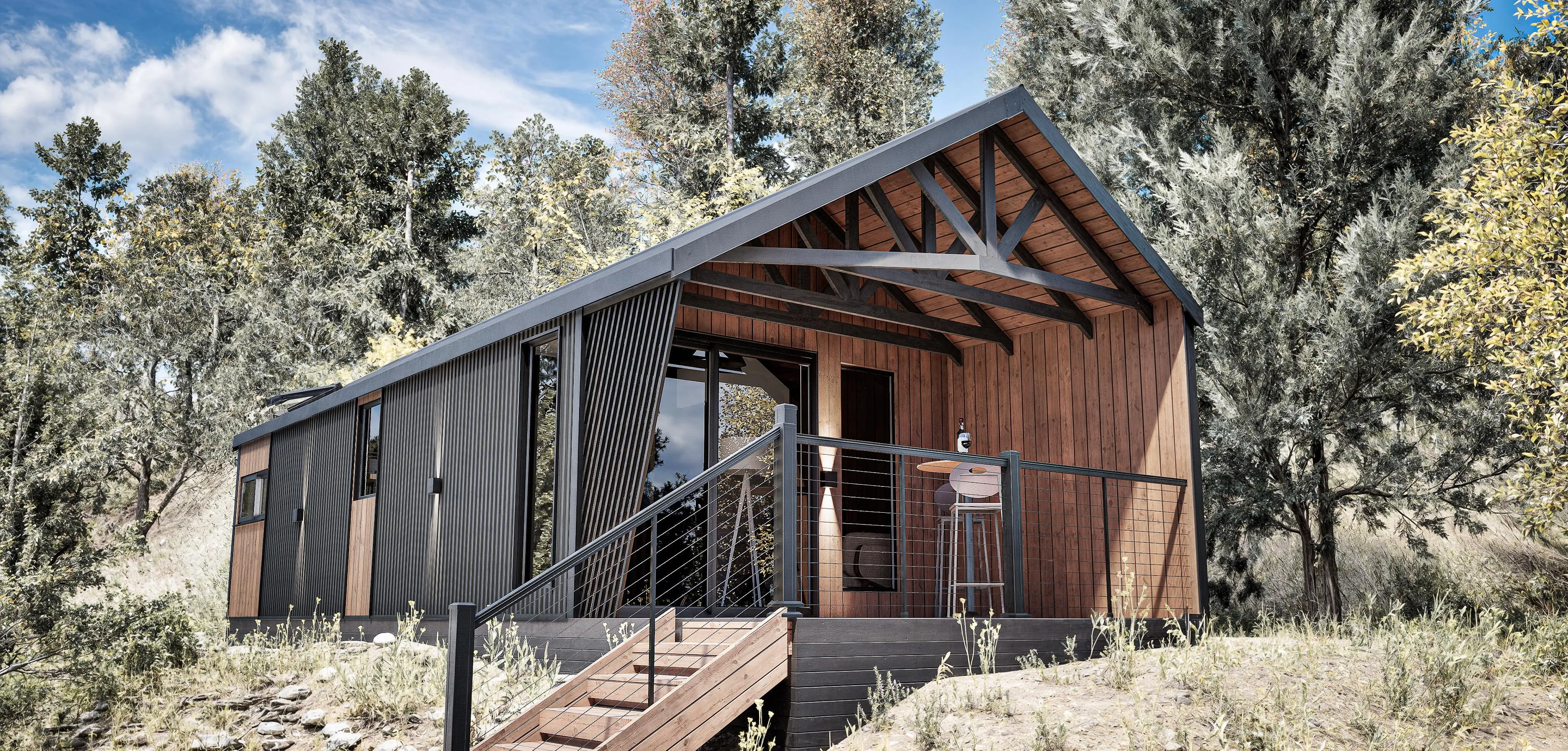 Modern cabin model Cliff with wood paneling and black accents surrounded by trees under a cloudy blue sky.