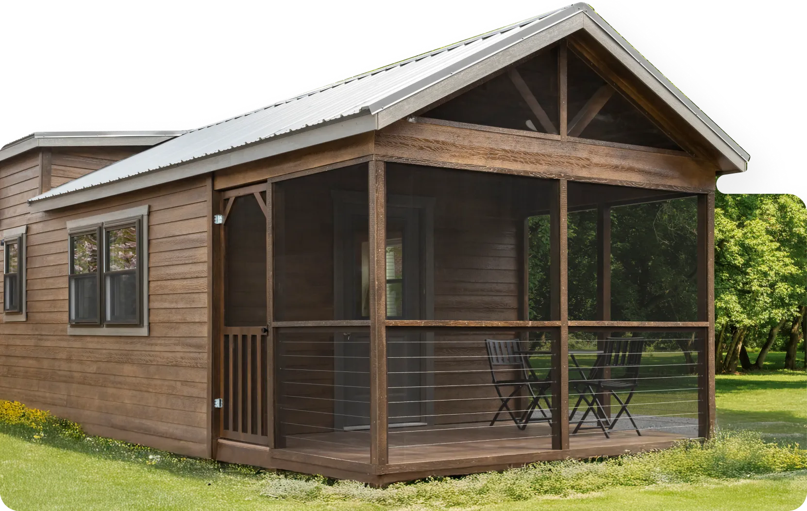 Aspen model wooden cabin with a screened-in porch featuring two black chairs and a table.